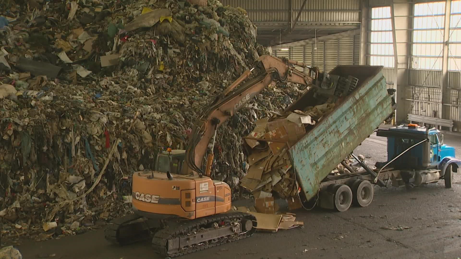 Steaming, rotting mounds of garbage, one of them at least 45-feet high, fill the Everett transfer station.