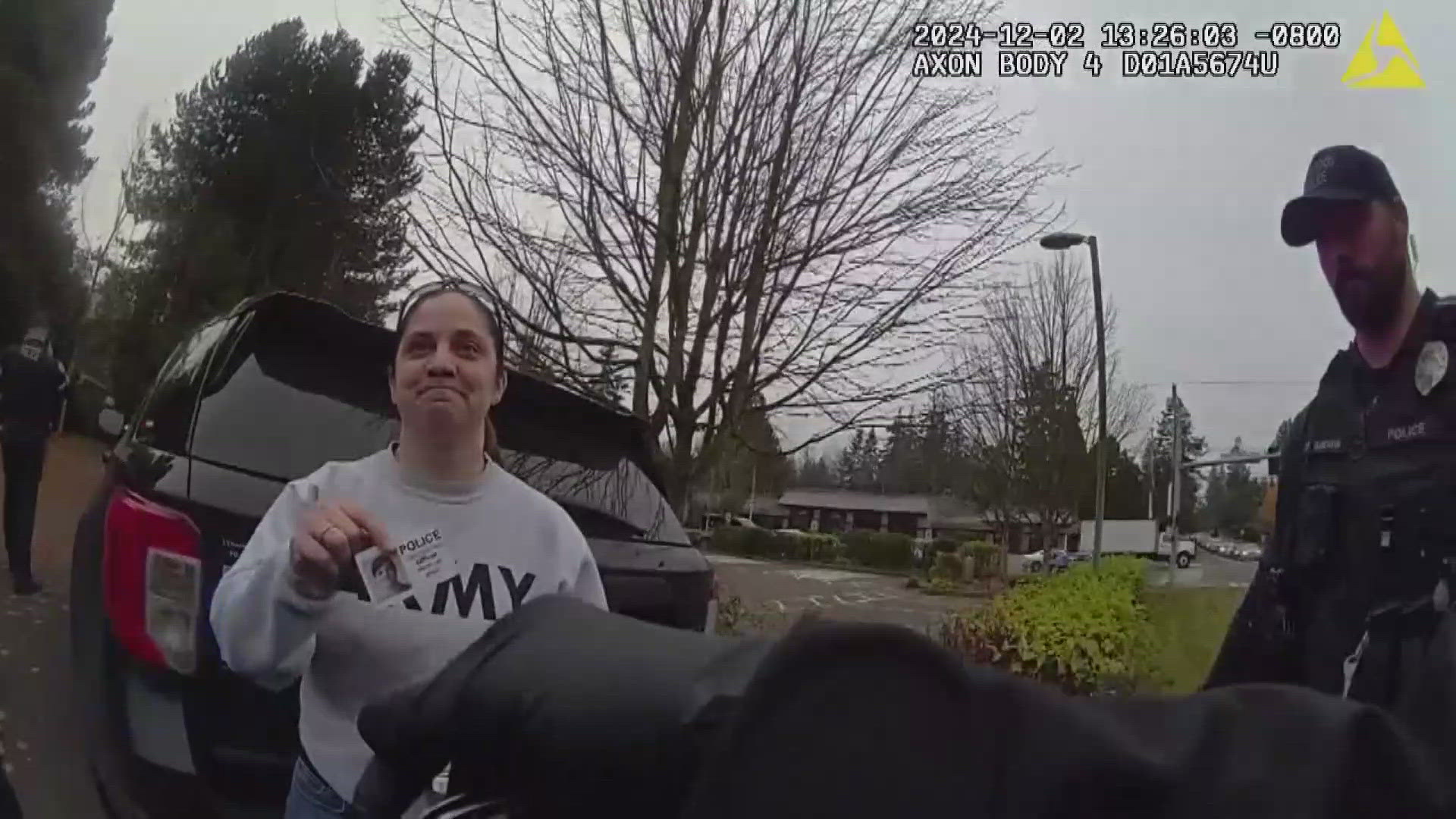 The young man who called 911 told police that she pointed her pistol at him during a road rage incident in Lynnwood last Monday.