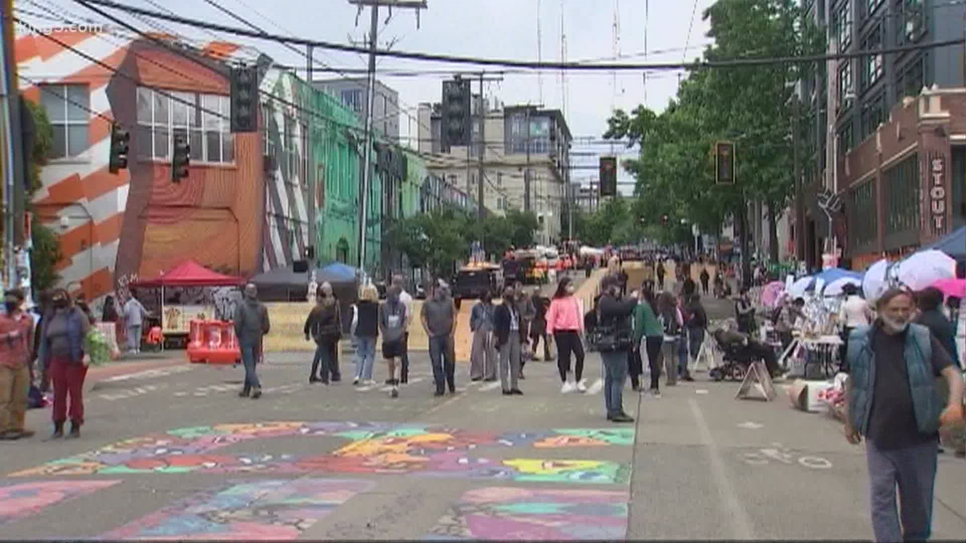 New concrete barriers are being installed in 'CHOP' - or 'Capitol Hill Organized Protest' zone - to protect people and let traffic flow.