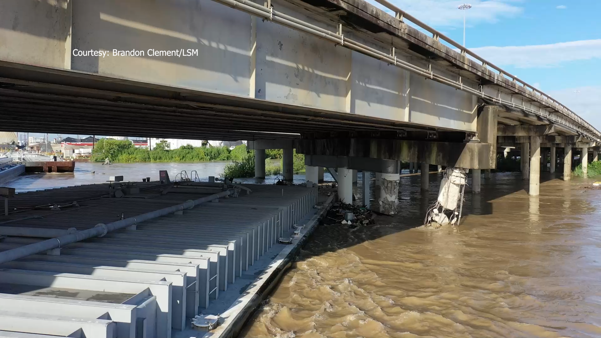 Watch as a drone flies around the runaway barge that crashed into I-10 over the San Jacinto River near Houston.