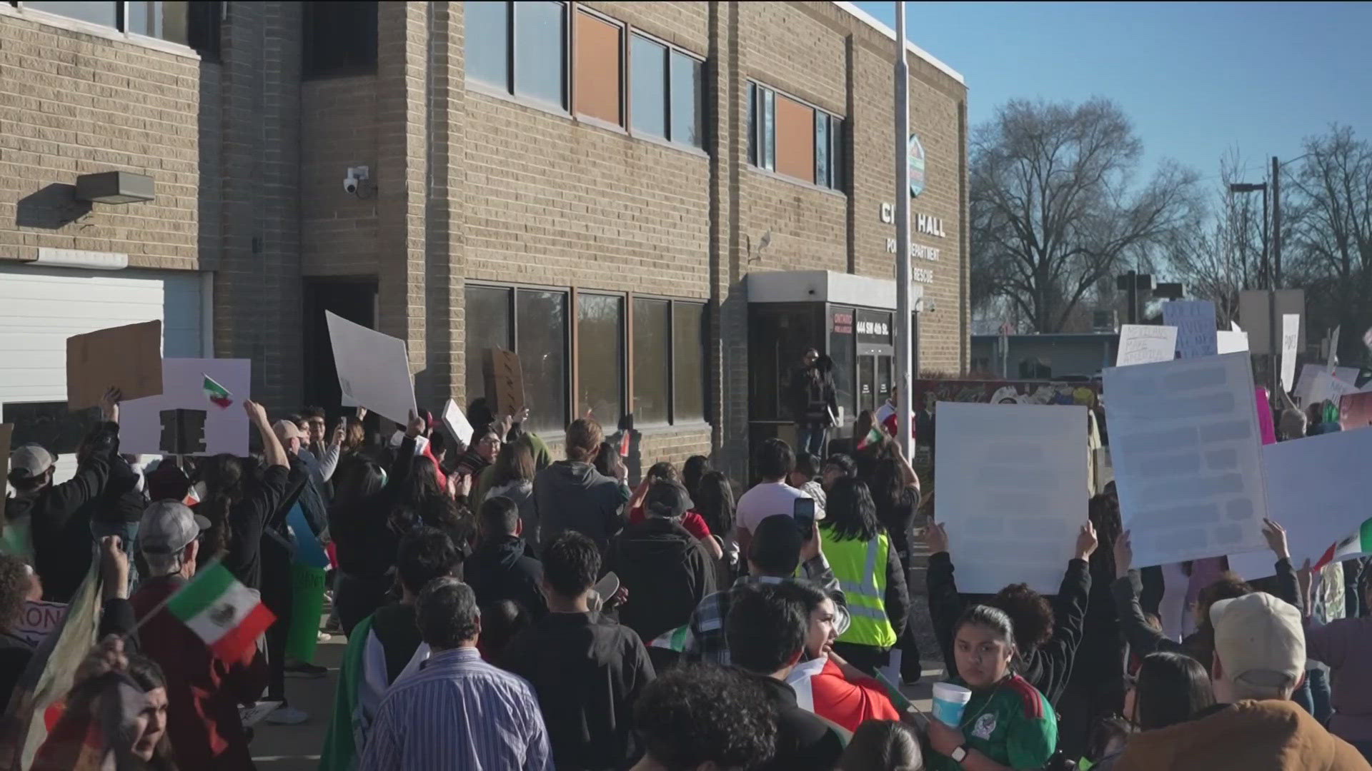 Over 150 people gathered in protest against the Trump administration's plan to crack down on illegal immigration and carry out large-scale deportations. 