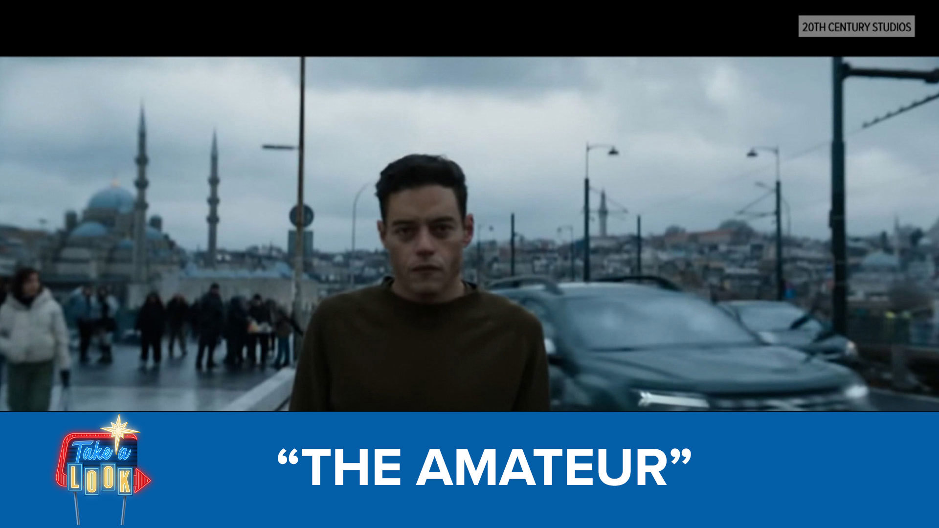 Rami Malek and Laurence Fishburne team up in “The Amateur.”