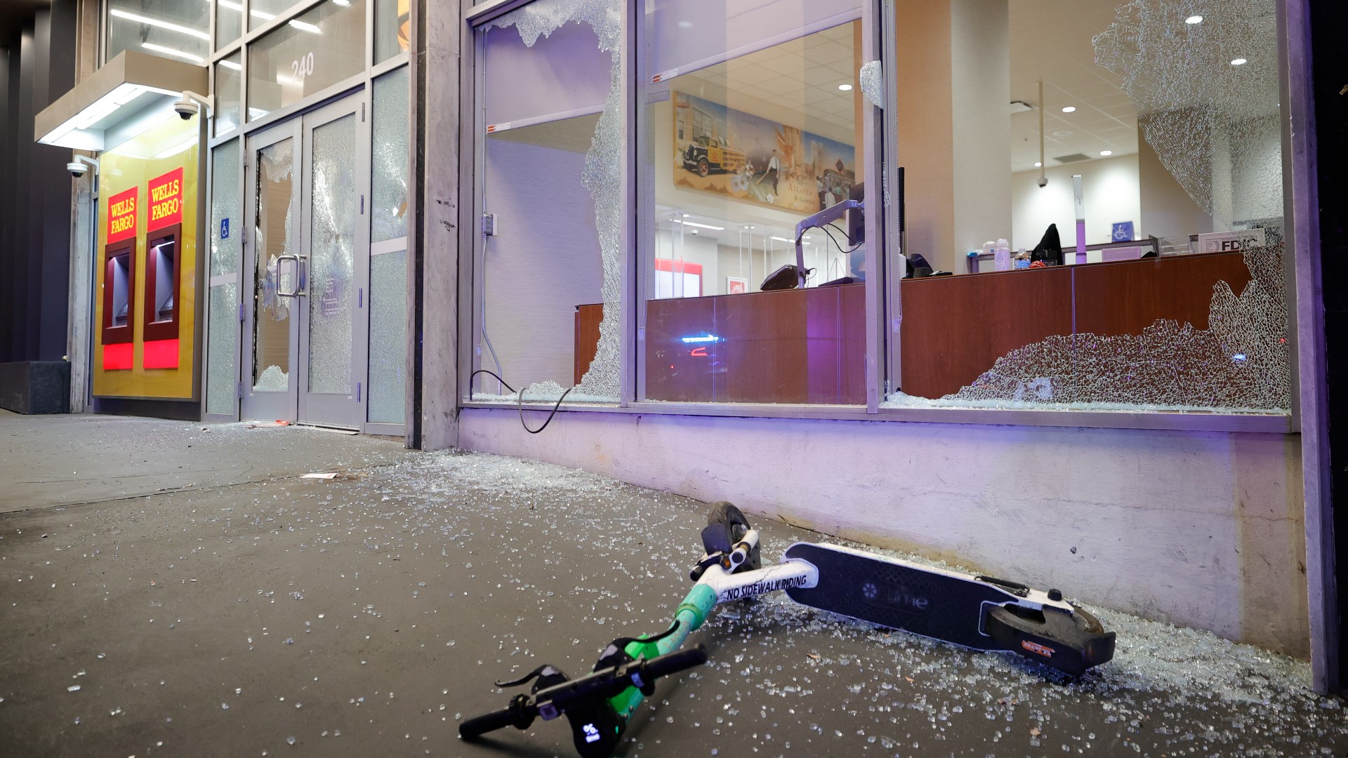 Activists threw rocks and reportedly lit fireworks in front of a building that houses the Atlanta Police Foundation.